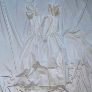 Medium white dress with bow in the back